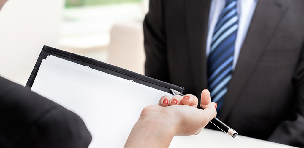 lady holding clip board