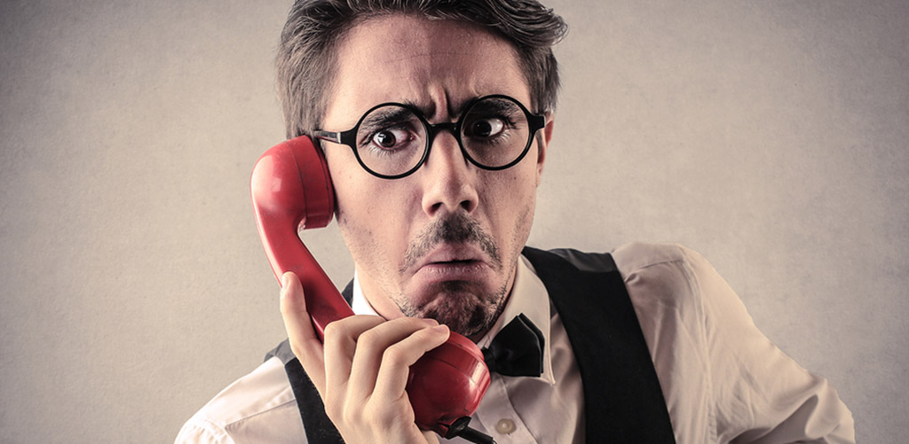 guy on a red phone