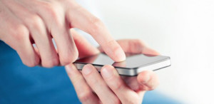 finger tapping an iPhone