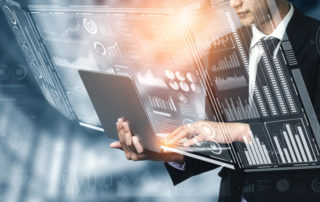 Man typing on laptop